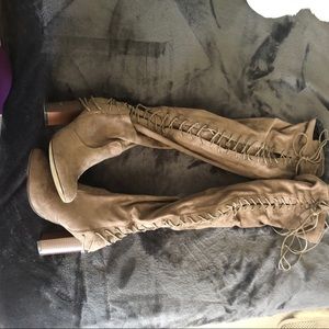 Over the knee lace up boots